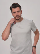 model wearing the grey techtee 100% mercerized cotton T-shirt